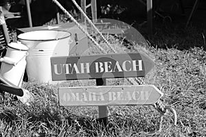 Signs with direction to utah and omaha beach d-day