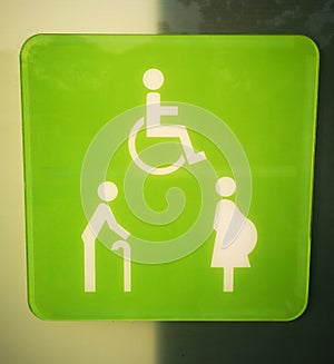 Signs for disabled people, elderly, pregnant women White on a green background