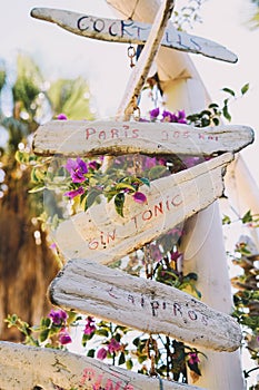 Signs indicating directions made by hand with wood