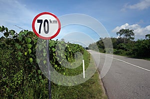 Signs on the limited speed highway 70km