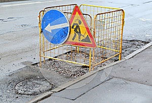 Signs of road works and mandatory detour