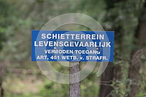 Signs with shooting range Dangerous along the artillery shooting camp `t Harde Oldebroek