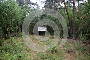 Signs with shooting range Dangerous along the artillery shooting camp `t Harde Oldebroek