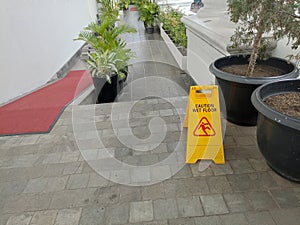 SIGNS OF WET FLOORS ON TERRACE