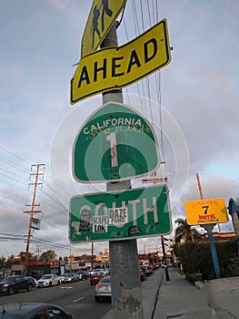 Signs you& x27;re in Venice Los Angeles California route one by the motel, parked cars, and traffic