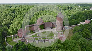Sigulda, Latvia - 25 june 2022: On a cloudy summer day, a beautiful aerial view of Turaida Castle in Latvia.