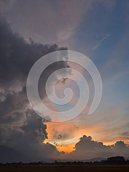 Sihlouette cloud against sun light background photo