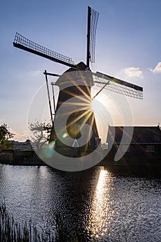 Sihlouette of a windmill, one of the Kinderdjik Windmills, a UNESCO World Heritage Site photo
