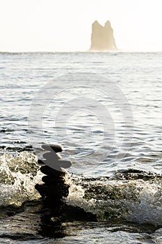 Sihlouetted Cairn in the Ocean