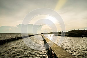 Sihouette concrete walkway for seaview in sunset