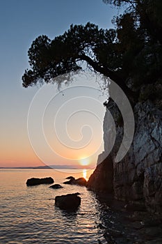 Sihouette of a rocks at sunset, Kastani Mamma Mia beach, island of Skopelos