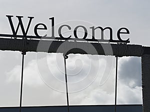 sihouette of welcome sign