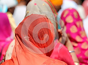 Sikh woman wearing a veil on her hair photo