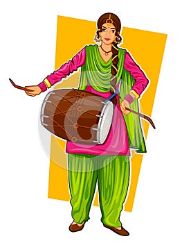 Sikh Punjabi Sardar woman playing dhol and dancing bhangra on holiday like Lohri or Vaisakhi