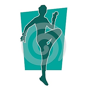 Silhouette of slim female doing exercise