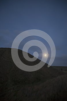 Silbury Hill in Avebury stone circule at night