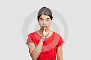 Silence gesture keep secret woman finger mouth