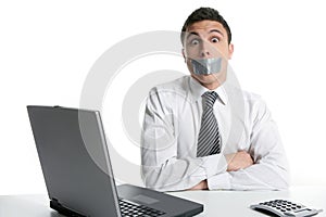 Silence with tape on mouth, businessman office