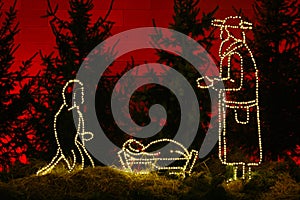 Silent night illuminated manger, Christianity photo