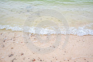 Silent sea waves crashing on a beach at Phi Phi Islands in Thailand