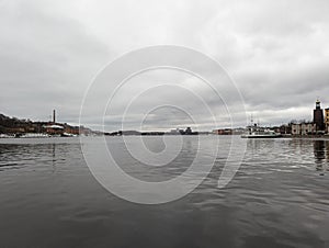 Silent waters against Stockholm skyline