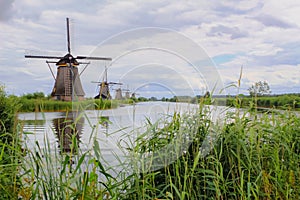 Silent windmills Kinderdijk water reflection