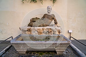 The Silenus statue on via del Babuino, Babuino fountain in Via Condotti, Rome, Italy photo