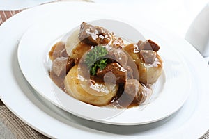 Silesian dumplings on white plate