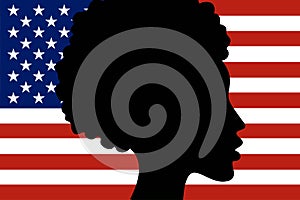 Silhouette of African-American girl head with National flag of United States of America on the background. Freedom