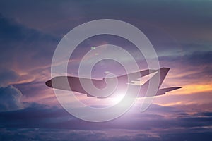Silhouette of Airplane take off on the Colorful dramatic sky wit