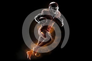 Silhouette of American football player, player in action on fire. Isolated on black background