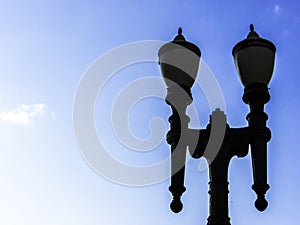 Silhouette of antique streetlamp