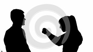 Silhouette of arguing man and woman. black and white mask