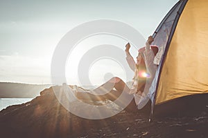 Silhouette Asian woman relaxing in nature winter season during camping