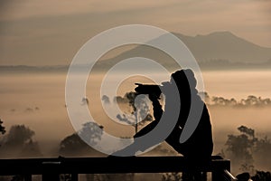 Silhouette asian women photography take a photo with beautiful s