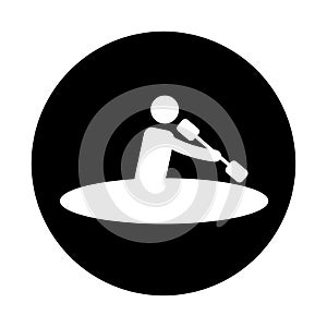 Silhouette of athlete practicing kayak photo