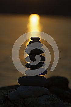 Silhouette of balanced stack pebbles