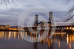 Silhouette bascule bridge across Willamette river in Portland ni