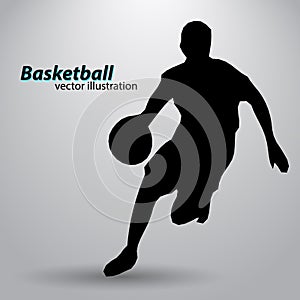 Silhouette of a basketball player.