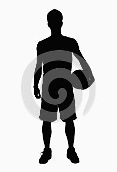 Silhouette of basketball player holding ball.