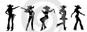 Silhouette of beautiful cowgirl girl dancing at the country music festival. Beautiful slender women in cowboy hat