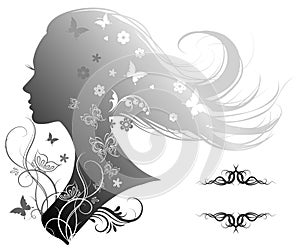 Silhouette of a beautiful woman with long hair