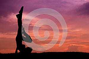 Silhouette of a beautiful Yoga woman