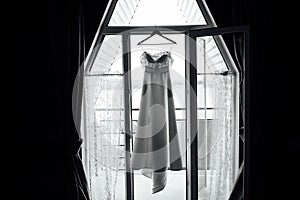 Silhouette of beige lace vintage wedding dress