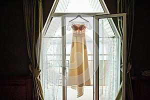 silhouette of beige lace vintage wedding dress