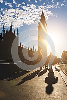 Silhouette of Big Ben and tourists in London at sunset