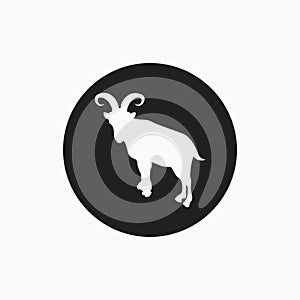 Silhouette of billy goat isolated on black circle - goat, sheep, lamb logo emblem or button icon silhouette - mammal, animal vecto