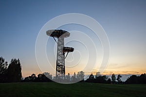 Silhouette of the  bird-nest looking public watchtower