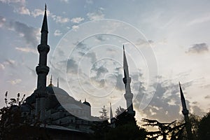 Silhouette of a Blue mosque minarets at sunset from historic part of Istanbul downtown