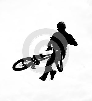 Silhouette of bmx riders in action